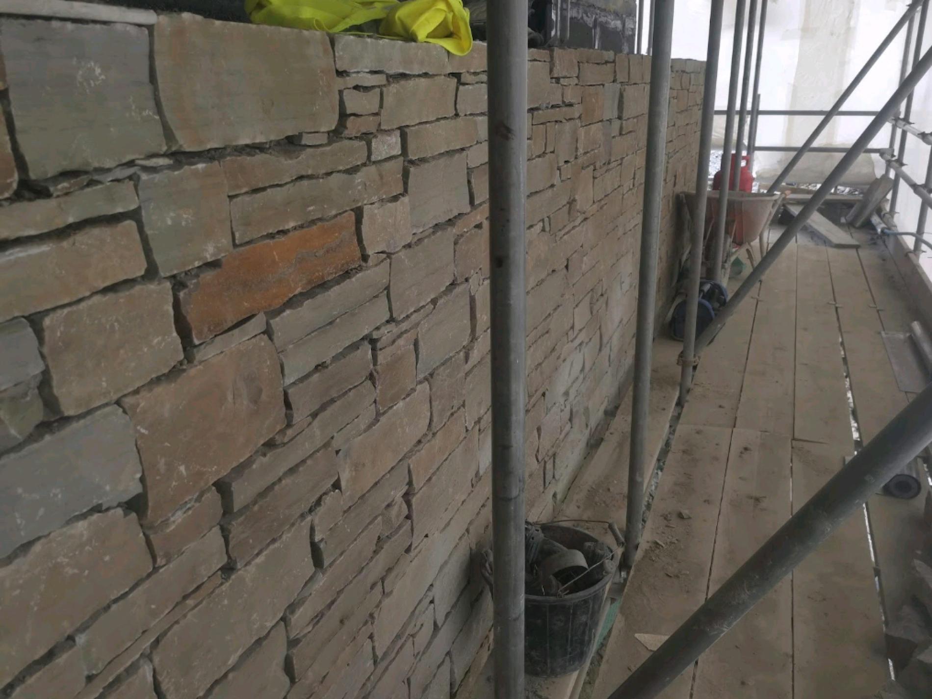 stone wall under construction